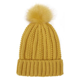 Winter Strickmütze mit Kunstfell Bommel - Warme Beanie für Damen